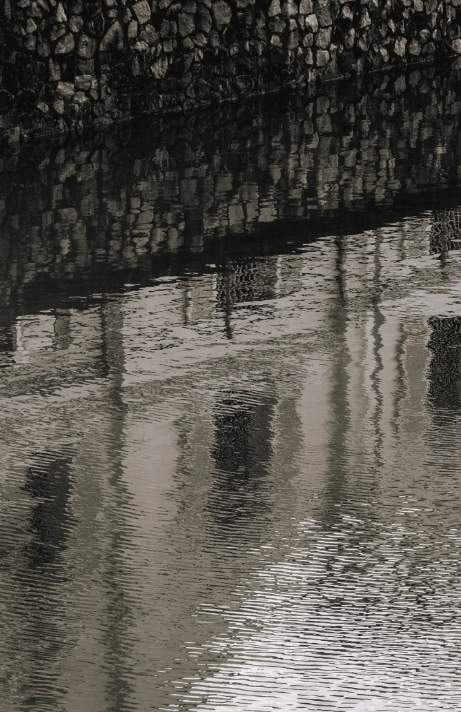 post-heritage-experience-2-1 image of reflections on a river surface